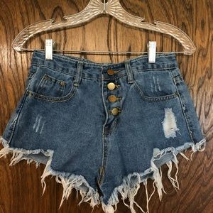 Ripped jean cutoff shorts